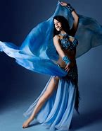 A person in a blue dress

Description automatically generated with medium confidence
