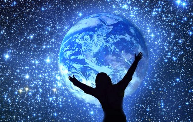 A person with their arms up in front of the earth

Description automatically generated